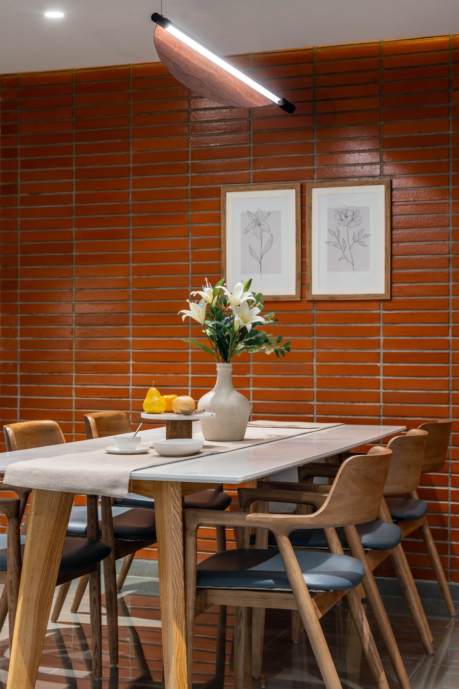 Dining table with wood-panel backdrop