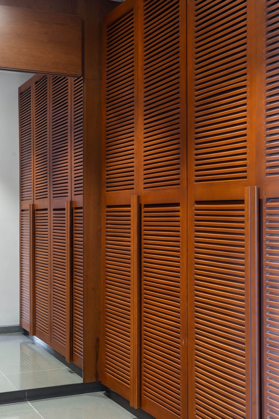 Louvred wardrobe doors in walnut