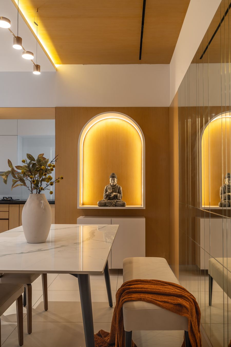 Dining space with backlit display niches