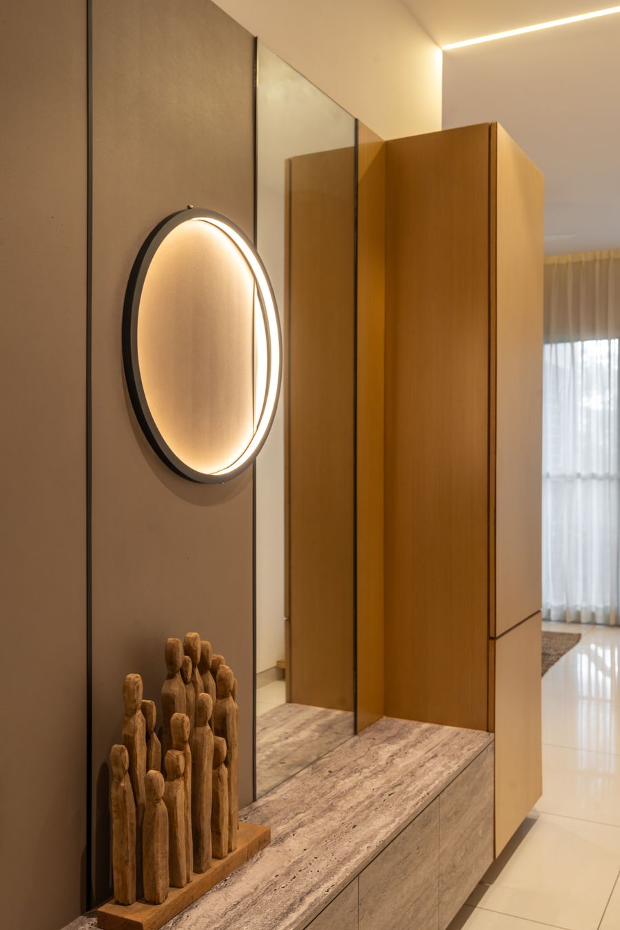Entry console with sculptural lighting