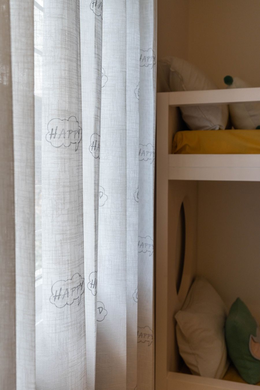 Children's bedroom with illustrated wall art