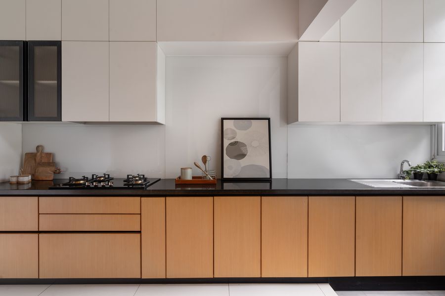 Modular kitchen with wood-tone cabinetry