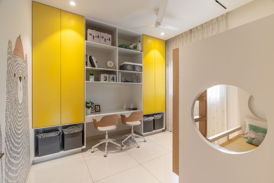 Study nook in mustard yellow with round mirror